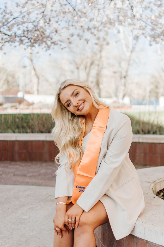Girl posing on boise state campus.